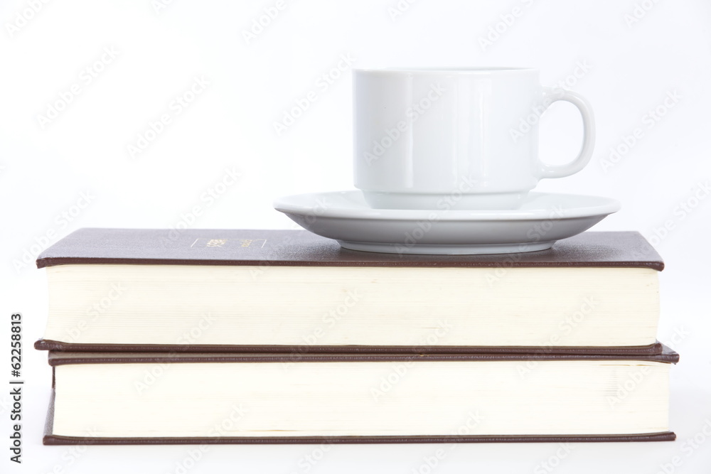 Composition with books and cup of coffee isolated on white Composition with books and cup of coffee isolated on white