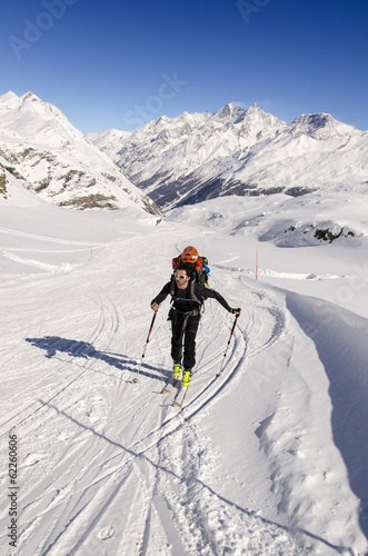 Touring skier in Swiss Alps