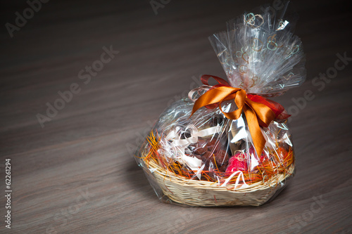 gift basket against wooden background