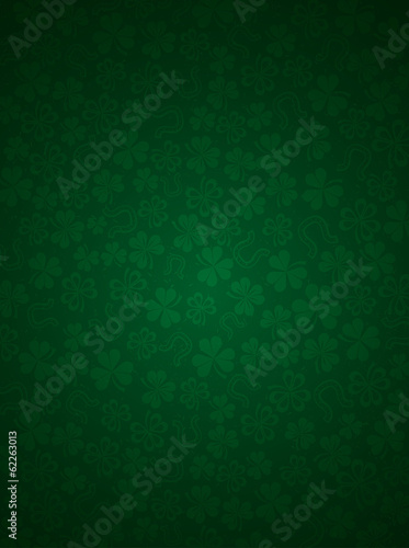 green background with shamrocks, vector illustration photo