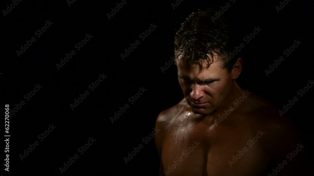 Intense athlete in bright light Intense athlete in bright light
