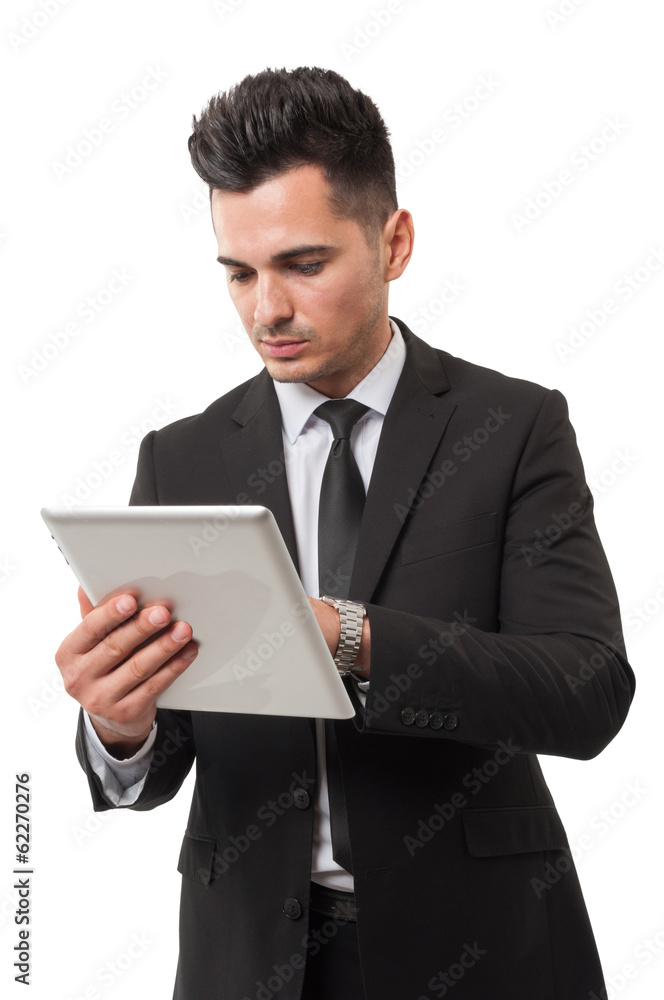 Business man checking his ipad for stock market news Business man checking his ipad for stock market news