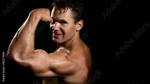 Muscular man posing
