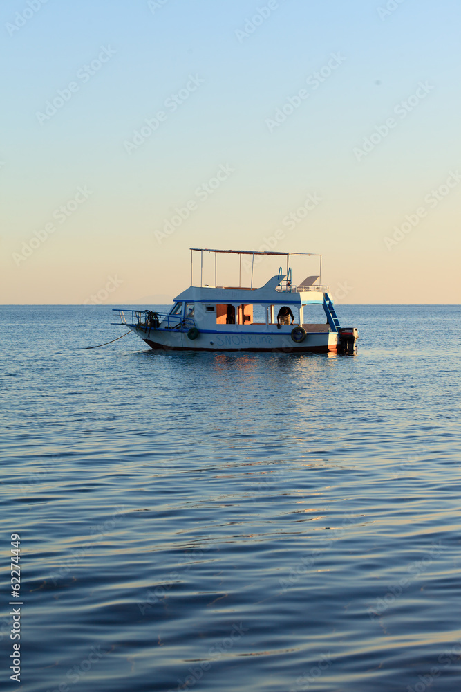 Naklejka premium catamaran on blue sea