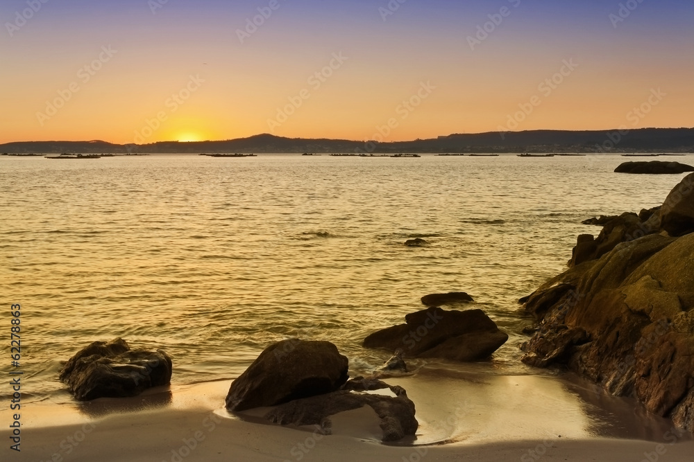 Rocks, beach and sea on Arousa Island