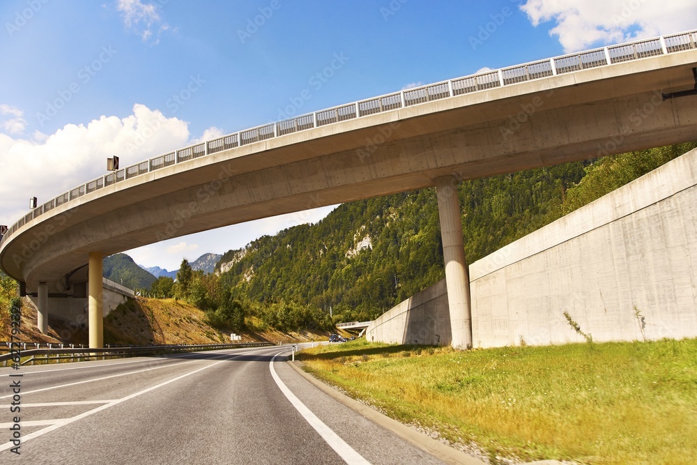 bridge with mountains and highway