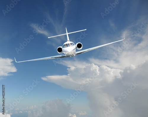 Private jet airplane in the sky