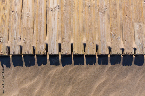 pine wood deck weathered in beach sand texture