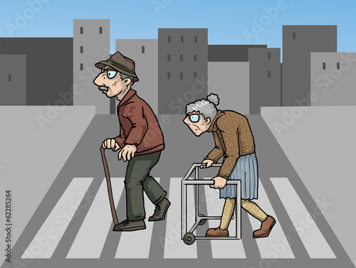 Two elderly people crossing a street