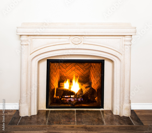 Luxurious White Marble Fireplace and empty wall © aetb