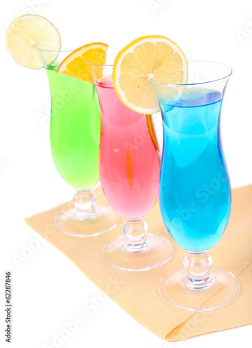 Glasses of cocktails isolated on white
