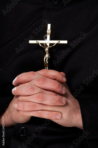 Priest with cross