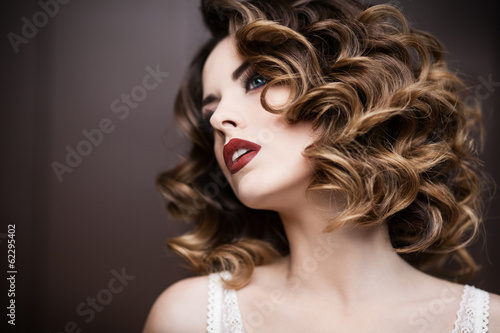 Beauty styled closeup portrait of a young woman