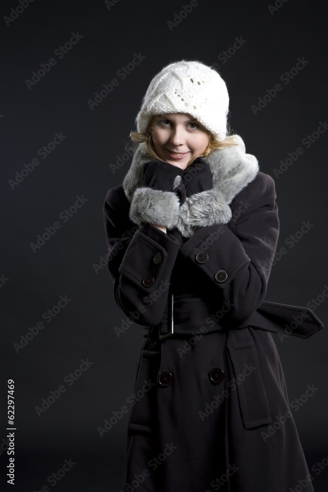Girl in studio, black background. Girl in studio, black background.