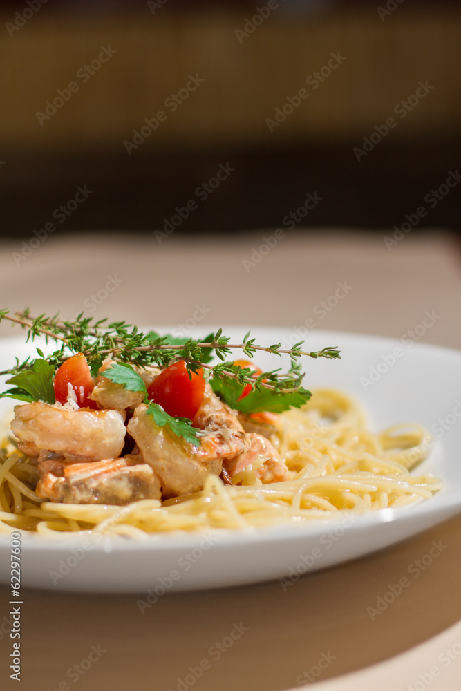 Image of tasty pasta with salmon and herbs Image of tasty pasta with salmon and herbs