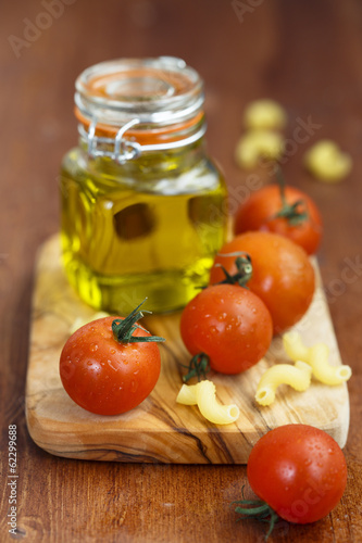 Olive oil, pasta and red cherry tomatoes
