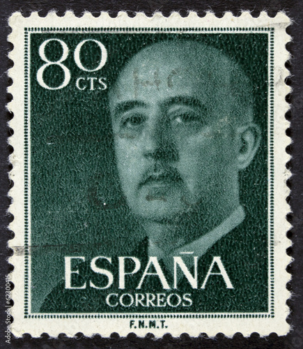 Post stamp printed in Spain shows Francisco Franco, circa 1955  photo