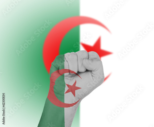 Fist wrapped in the flag of Algeria
