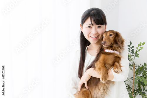 young asian woman and dog lifestyle image