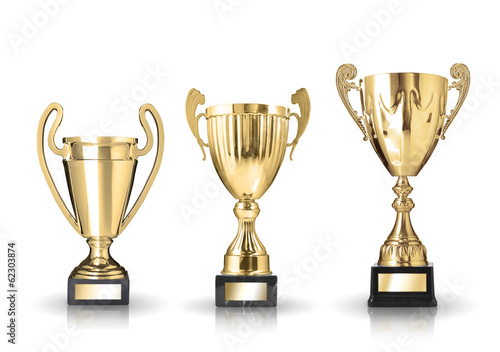 three different kind of golden trophies. Isolated on white backg