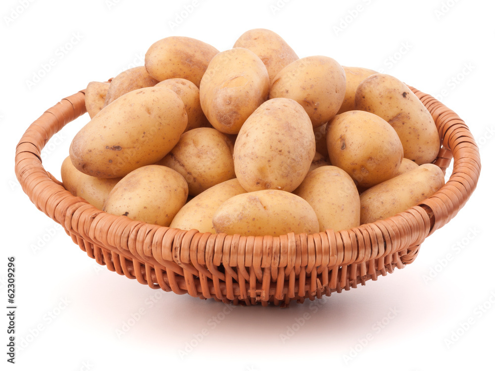 Potato tuber in wicker basket isolated on white background Potato tuber in wicker basket isolated on white background