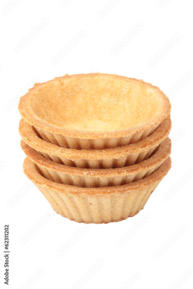 Stack of empty tartlets on white Stack of empty tartlets on white