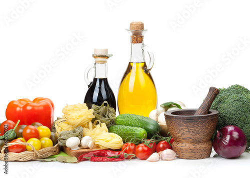 Fototapeta Naklejka Na Ścianę i Meble -  Fresh ingredients for cooking: pasta, tomato, cucumber, mushroom
