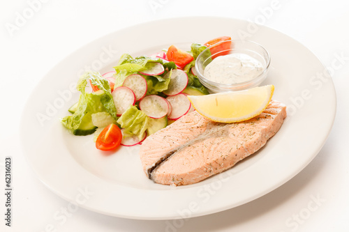 salmon steak with salad