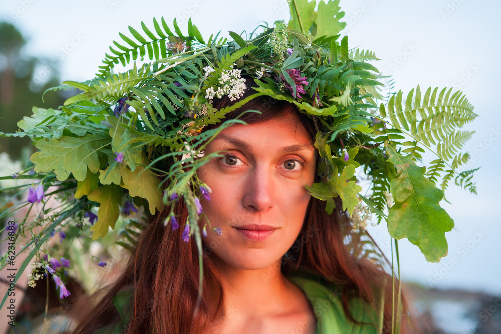 Beautiful Girl with summer bouquet and wreath of grass. Beautiful Girl with summer bouquet and wreath of grass.