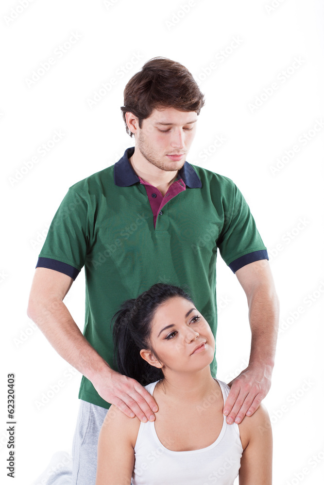 Trainer massaging a woman