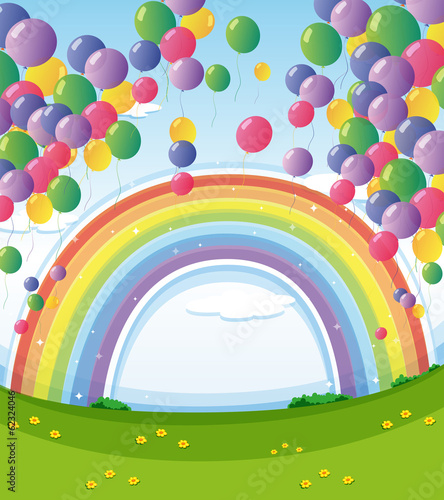 A sky with a rainbow and a group of floating balloons