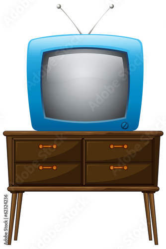 A television above the wooden table
