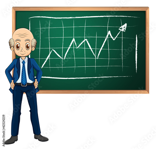 An old businessman in front of the blackboard