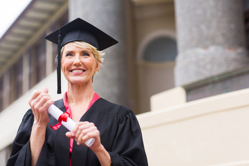senior graduate holding certificate