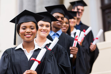 group of university graduates at graduation