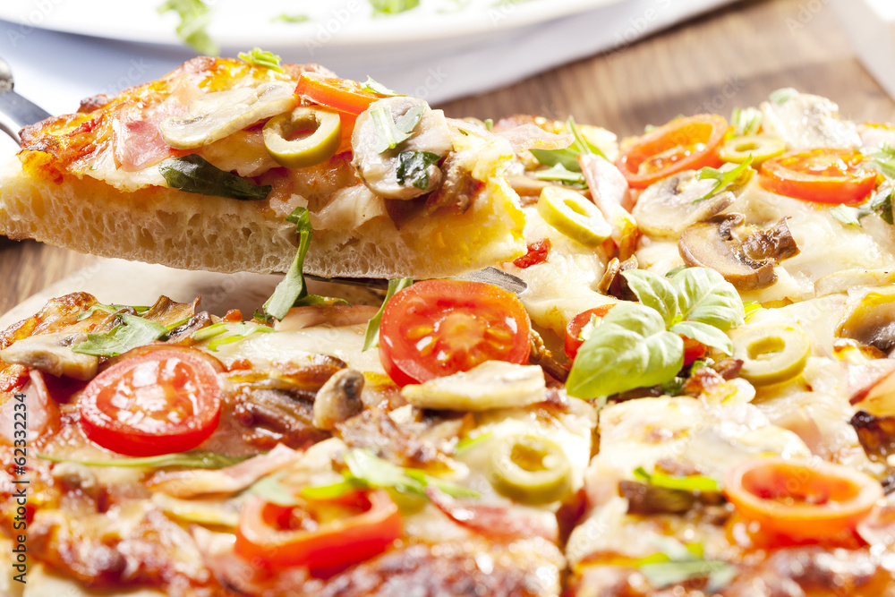 Pizza with ham and mushrooms Pizza with ham and mushrooms