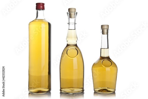 Set of brandy bottles isolated on white background
