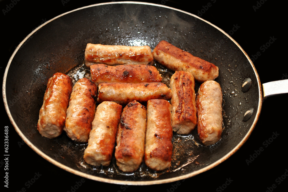 Breakfast Sausage Links Frying in a Pan Breakfast Sausage Links Frying in a Pan