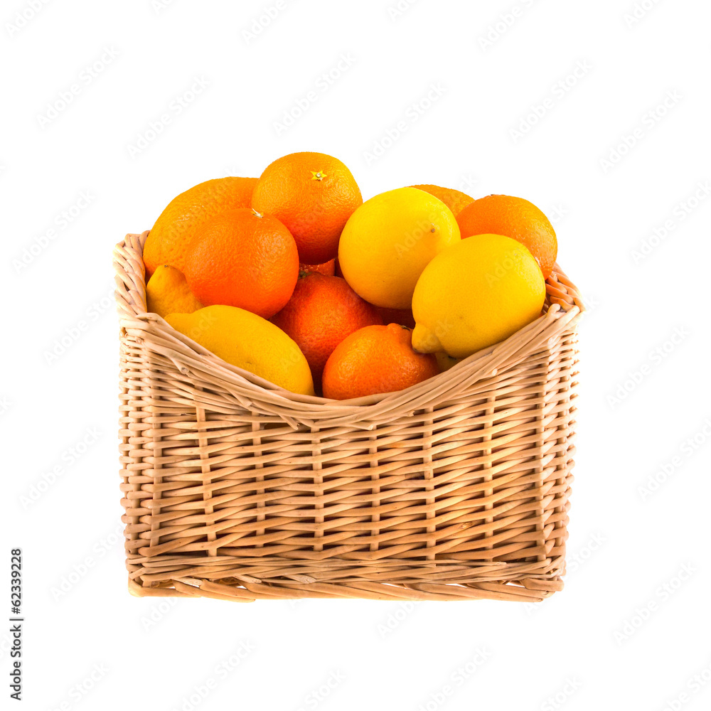 Oranges and lemons in a wooden basket. Oranges and lemons in a wooden basket.