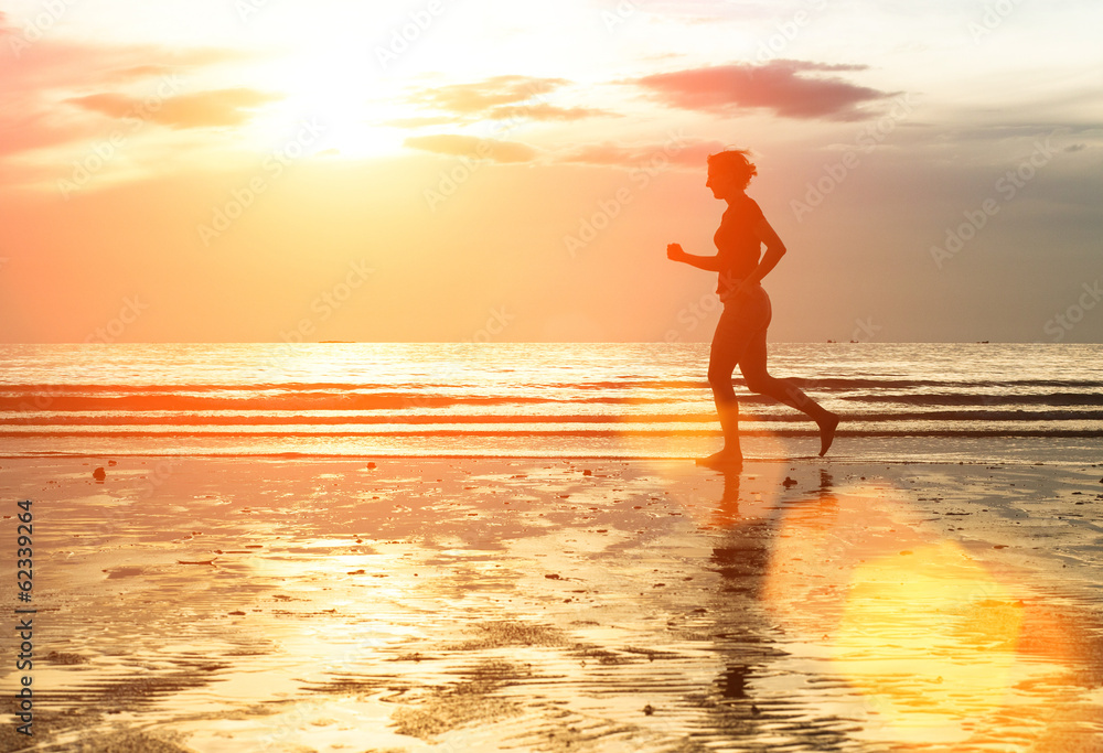 Silhouette of woman jogger at sunset on the seashore. Silhouette of woman jogger at sunset on the seashore.