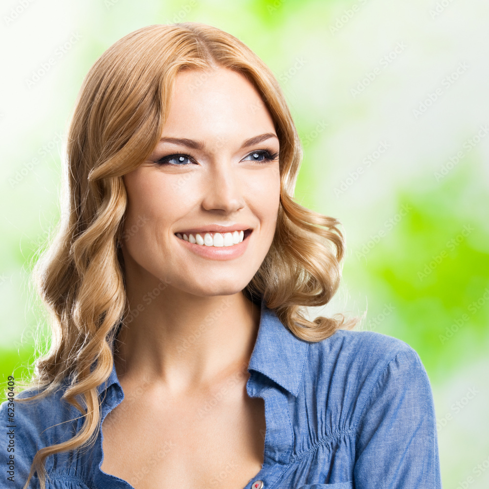 Happy smiling woman with long hair, outdoor Happy smiling woman with long hair, outdoor