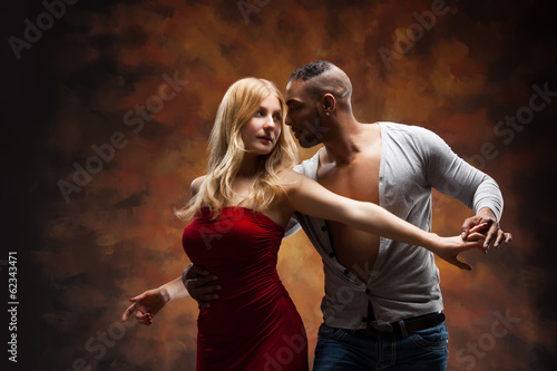 Young couple dances Caribbean Salsa photo