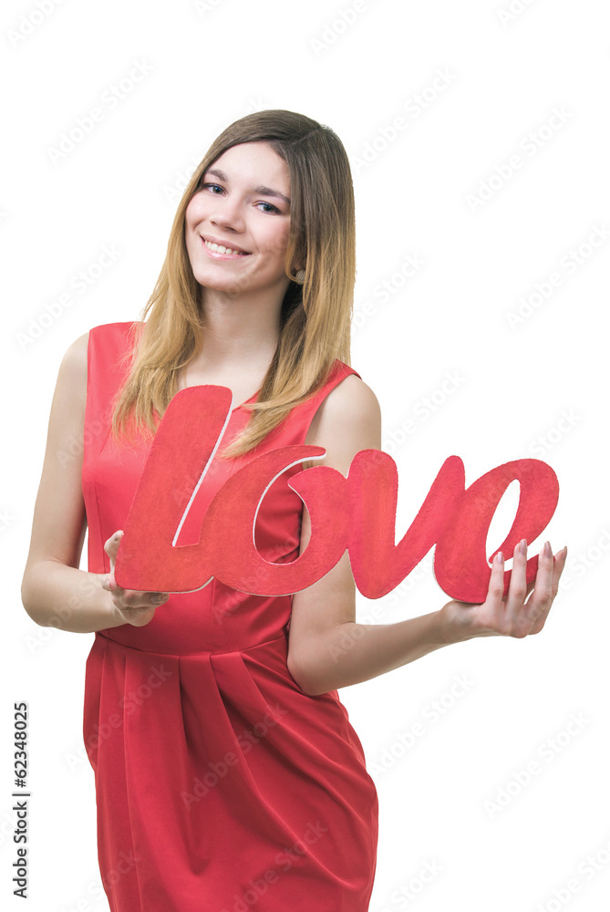 Smilling girl, holding title Love in her hands Smilling girl, holding title Love in her hands