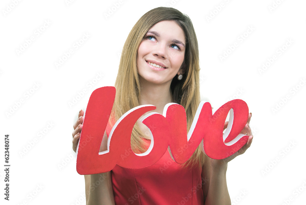 Smilling girl, holding title Love in her hands Smilling girl, holding title Love in her hands