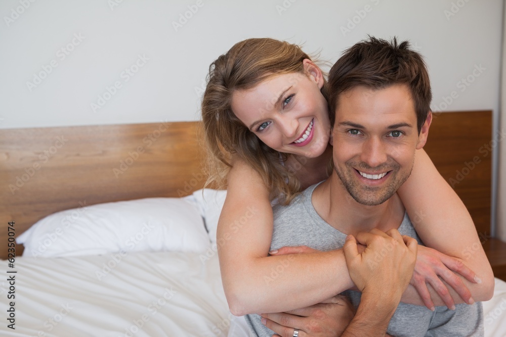Close-up of loving relaxed couple in bedroom Close-up of loving relaxed couple in bedroom