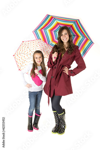 Cute woman and girl models holding colorful umbrellas