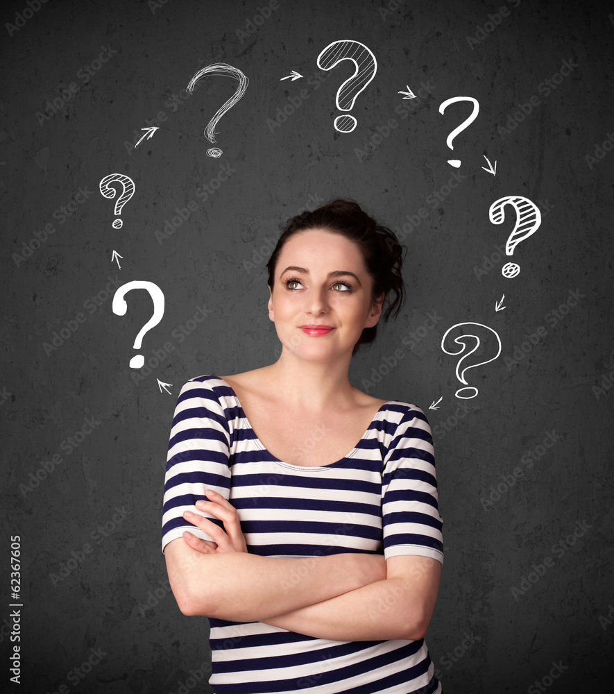 Young woman thinking with question mark circulation around her h Young woman thinking with question mark circulation around her h