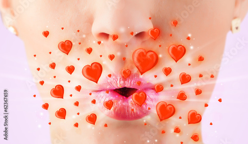 Pretty lady lips with lovely red hearts