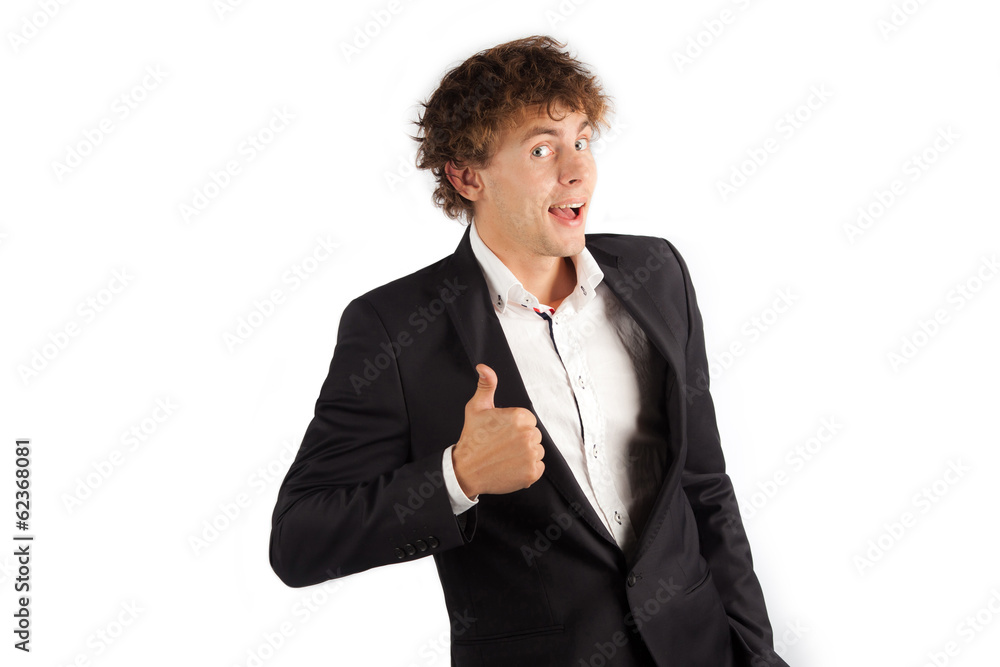 Studio shot of business man showing thumbs up sign Studio shot of business man showing thumbs up sign