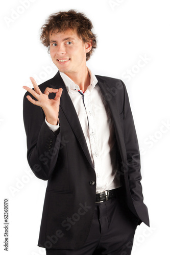 Happy smiling cheerful young business man with okay gesture, iso